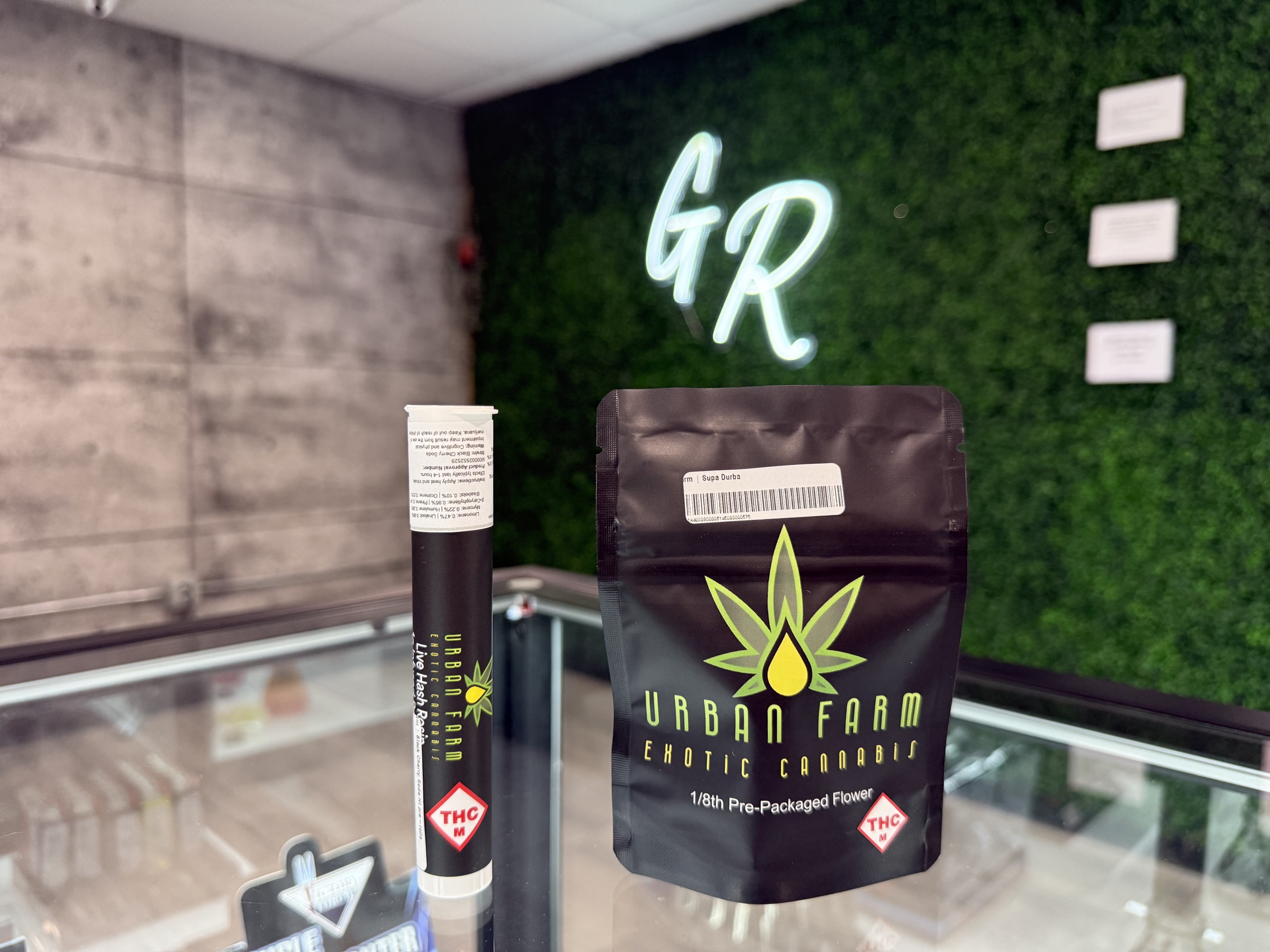 Grass Roots Dispensary interior moss wall — serving Scott City and Cape Girardeau