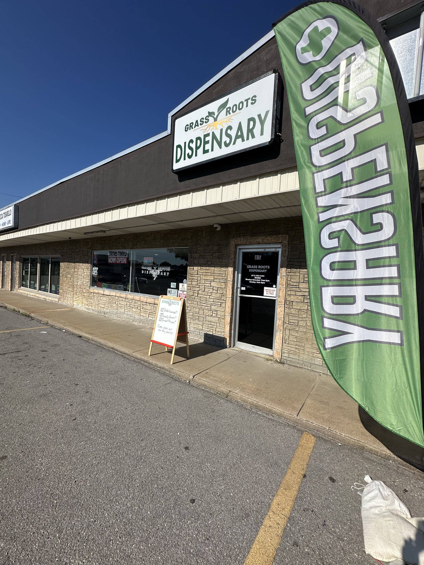 Grass Roots Dispensary storefront and sign on South Plaza Way, Cape Girardeau